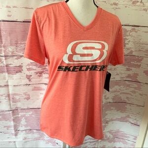 Skechers Logo Peach Women’s VNeck Workout Top In a size Medium